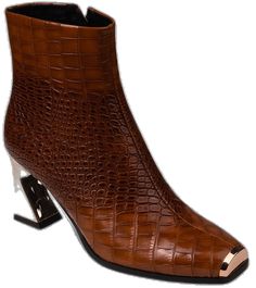 a pair of brown boots with metal heelings on the side and an alligator skin pattern