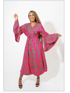 Make a bold statement in this in this African print wrap dress. It wraps around you like a robe with two straps to cinch the waist. It fits up to a 55" bust and has a length of 54". 100% cotton. Machine wash in cold water. Gentle cycle dry. Summer Wrap Dress With Kimono Sleeves And Belted Waist, Summer Wrap Dress With Kimono Sleeves And Belt, Pink Wrap Dress For Summer, Pink Wrap Dress For Spring, Spring Wrap Dress With Belted Kimono Sleeves, Green Tie Waist Wrap Dress For Vacation, Pink Wrap Dress With Tie Waist, Pink Wrap Dress With Tie Waist And Surplice Neckline, Beach Wrap Dress With Belt