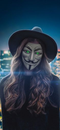 a woman wearing a mask in front of a cityscape with green eyes and long hair