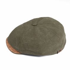 a flat cap with cork brimmed on the front and side, in olive green