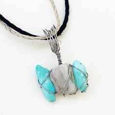 Handcrafted By Me With Love And Attention To Detail! Every Piece Is Unique & One Of A Kind. Genuine Raw Sleeping Beauty Turquoise And Moonstone In A Silver Wire Wrap Setting. So Pretty & Feminine. Pendant Is 1 Inch From Top To Bottom. Comes With 2 Natural Hemp Cords.. Black & Natural With Treated Ends. Each Is 30 Inches Long For You To Tie At Any Length You Wish. Thank You For Supporting Creative, Small Businesses And Have A Blessed Day! Artisan, Edgy, Different, Statement Piece Adjustable White Turquoise Necklace As Gift, Adjustable White Turquoise Necklace For Gift, Handmade White Amazonite Jewelry, Adjustable Turquoise Necklace As A Gift, Adjustable Turquoise Necklace For Gift, Adjustable Light Blue Turquoise Necklace Gift, Raw Rose Quartz Necklace, Marble Necklace, Lariat Necklace Silver