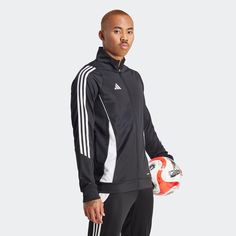 Don't revert back to your old worn-out, outdated adidas track jacket when the adidas Tiro24 Men's Track Jacket is waiting. The adidas Tiro24 men's track jacket has that adidas style, and you'll instantly recognize it the moment you lay eyes on it. And when it comes to the perfect fit, this'll fit you to a T (so make sure to buy your usual size). Moisture-wicking. Zip-up. adidas branded. Long neck. Stripes down sleeves. Fabric: 100-percent polyester. Adidas Sl 72, Adidas Training, Soccer Shop, Gym Fits, Adidas Track Jacket, Mens Soccer, Adidas Fashion, Energy Bars, Break In