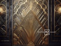 an art deco style door with gold and black paint on the doors, in front of a dark background