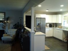 the kitchen is clean and ready to be used as a living room or dining area