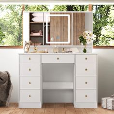 a white desk with drawers and a mirror