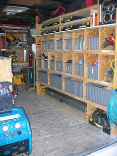 the inside of a garage filled with tools and other items, including shelves that hold various types of equipment