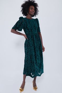 Green Velvet Eyelet Catalina Dress | Tuckernuck Elegant Festive Velvet Dress, Elegant Dark Green Gala Dress, Chic Dark Green Formal Dress, Elegant Fitted Green Velvet Dress, Chic Green Velvet Dress, Green Velvet Dress For Formal Occasions, Festive Green Elegant Midi Dress, Elegant Green Midi Dress For Festive Season, Elegant Green Festive Midi Dress