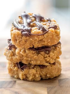 three oatmeal cookies stacked on top of each other