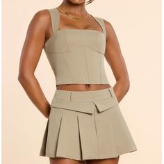 Oh Polly Laurel Square Neck Tailored Top And Maize Pleated Mini Skirt In Taupe, Skirt Is A Size Uk 8, Top Is A Size Uk 10. I’m 5’6, 130 Lbs And Size B Cup And The Set Fits Me Great. Brand New With Tags. Top Armpit To Armpit: 15” Length From Armpit: 9.5” Skirt Waist: 15” Length: 12.5” Taupe Skirt, Tennis Core, Summer 25, Embellished Skirt, 130 Lbs, Skirt And Top Set, Nike Tennis Dress, Oh Polly, B Cup