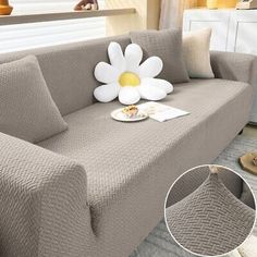 a couch with a flower sitting on top of it