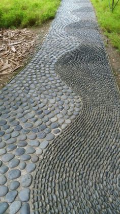 an image of a stone path that looks like it is made out of rocks and pebbles