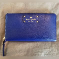 Beautiful Blue Neda Wallet. Lots Of Pockets And Space To Store Cards And Money. Nwt. Classic Blue Travel Clutch, Classic Blue Clutch For Travel, Classic Blue Bags With Card Slots, Elegant Blue Clutch With Zipper Closure, Everyday Blue Wallet With Zipper Closure, Blue Clutch Wallet For Everyday Use, Kate Spade Blue Rectangular Wallet, Elegant Blue Wallets For Everyday Use, Elegant Blue Everyday Wallet