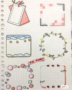 an open notebook with paper cut outs and stickers on the pages, including tags