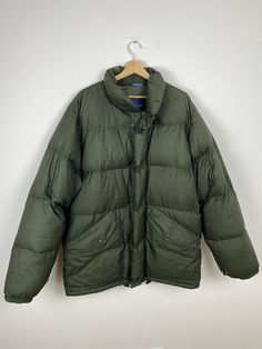 Moncler Green Puffer Jacket. Size: XL Condition: perfect Material: Polyester for the fabric and goose for the lining. ------------------------------------------------------------------ SHOP POLICIES AND GENERAL INFO: Please check measurements or ask any questions BEFORE your purchase. Please check detailed description. All items have a history and ParisVintagePro strives to choose only items that are in very good used condition. Irregularities or slight signs of wear might be present. Color repr Green Down Puffer Outerwear, Khaki Puffer Outerwear For Cold Weather, Green Puffer Jacket With Pockets For Outdoors, Green Puffer Jacket For Outdoor, Green Down Puffer Jacket, Green Down Puffer Jacket For Winter, Green Puffer Jacket With Pockets For Outdoor Activities, Green Long-sleeve Puffer Jacket With Pockets, Green Long Sleeve Puffer Jacket With Pockets