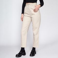 Vintage 90s off-white khaki cotton trousers by Liz Claiborne, with small front pockets, and a tapered leg.  Measurements and Condition: Fits like: Labeled size 6, women's small Fabric: Cotton Brand: Lizsport by Liz Claiborne Condition: Excellent Waist: 26.5" Hips: 38" - taken at the bottom of the zipper opening Rise: 12" Inseam: 27" Shown on a 5'8" model with measurements of 34"-26"-37", usually wears a size small. See our FAQ for more info on sizing and condition ratings. High-waisted Tapered Cotton Cargo Pants, Cream Straight Cargo Pants For Spring, High-waisted Beige Cotton Chinos, Beige High-waisted Cotton Chinos, Retro Beige Straight Leg Pants, Retro Beige Cotton Bottoms, Fitted Beige Cotton Work Pants, Beige Straight Leg Chinos For Spring, Beige Chinos With Belt Loops For Spring