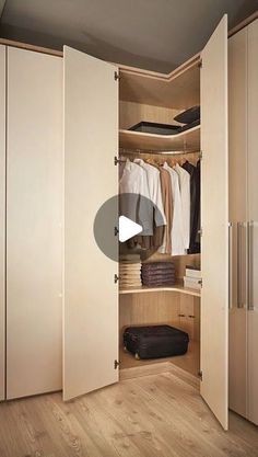 an open closet with clothes and other items in it