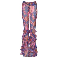 ▪ Dolce & Gabbana Silk Chiffon Ruffled Flared Pants ▪ Spring-Summer 2004 ▪ Semi-transparent silk chiffon pants with floral and paisley-inspired print ▪ Layered, cascading ruffles that begin at the knee and extend to the hem ▪ Wide waistband for a secure fit ▪ Snap button and zip fly closure ▪ Material: 100% Silk ▪ Colour: Pink/Purple/Blue/Golden-Yellow ▪ Made in: Italy ▪ Size: IT40 - FR36 - UK8 - US6 ▪ Mannequin is 183 cm / 6ft The photographs presented in this listing, with the exception of any Chiffon Pants, Rose Violette, Cascading Ruffles, Pink Purple Blue, Chiffon Ruffle, Flared Pants, Wide Waistband, Dolce & Gabbana, Silk Chiffon