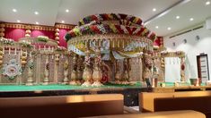 an elaborate stage set up for a wedding ceremony