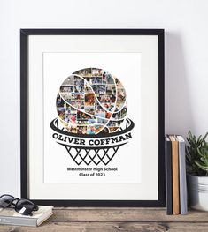 a framed photo with the words silver company on it next to some books and glasses