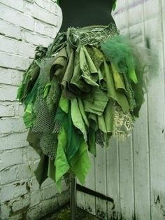 a mannequin made out of green fabric