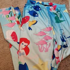 One Size Ariel Mermaid Pants With Flounder And Sebastin With Other Characters Never Worn. Great Condition. Smoke And Pet Free House Playful Stretch Blue Bottoms, Fun High Waist Fitted Bottoms, Fun Fitted High-waist Bottoms, Summer Stretch Mermaid Bottoms, Blue Stretch Mermaid Bottoms, Stretch Blue Mermaid Bottoms, Playful Fitted Blue Bottoms, Mermaid Pants, The Little Mermaid Ariel