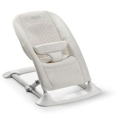 a baby swing with the seat up on it's legs and footrest down