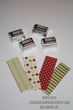 some candy bars are sitting next to each other on a white counter top with polka dots and stripes