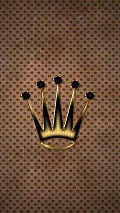 a gold crown on top of a metal surface