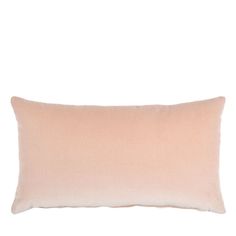 a pink pillow on a white background