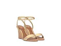 Vince Camuto Jefany - Women's Sandals : True Gold : Redefine elegance with every step by wearing the Vince Camuto Jefany, where minimalism meets sophistication. This dress wedge boasts a sculpted silhouette, creating the illusion of a sleek stiletto from behind. Its single band toe strap and almond-shaped open toe add chic simplicity, while the angled sling and bracelet straps with adjustable buckle ensure a secure fit. Leather upper. Polyester lining. Synthetic insole. Rubber outsole. Measurements: Heel Height: 3 2 5 in Weight: 1 lb 14.4 oz Product measurements were taken using size 5, width M. Please note that measurements may vary by size. Almond Shaped, Women's Sandals, Vince Camuto, Open Toe, Womens Sandals, Heel Height, Leather Upper, Wedges, Buckle