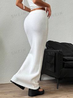 Style:Elegant \nDetails:Rib-Knit \nColor:Apricot \nPattern Type:Plain \nFit Type:Skinny \nTemperature:Late Fall (10-17℃/50-63℉) \nWaist Line:Natural \nLength:Long \nFabric:Medium Stretch \nMaterial:Fabric \nComposition:44% Acrylic \nComposition:29% Polyester \nComposition:27% Polyamide \nCare Instructions:Hand wash or professional dry clean \nSheer:No \n Stretch Ribbed Knit Skirt, Solid Ribbed Knit Skirt, Stretch Knit Ribbed Skirt, Solid Color Ribbed Knit Skirt, White Stretch Ribbed Skirt, White Ribbed Stretch Skirt, Elegant White Ribbed Bottoms, Knitted Suit, Late Fall