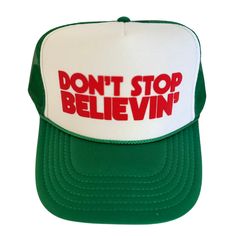 Don't Stop Believin' Trucker Hat Spreading the Holiday Cheer! This his or hers trucker is part of our Holiday Collection. Cute and perfect for all your Holiday events. So light, medium profile and a perfect addition to your growing hat collection. 5 Panel Foam Mesh Back Trucker, Pro Style Adult Sizing 100% Poly Foam Front, 100% Nylon Back White Retro Trucker Hat With Curved Brim, Retro White Trucker Hat With Curved Brim, Vintage White Trucker Hat With Short Brim, White Retro Snapback Hat With Short Brim, White Snapback Hat With Letter Print And Short Brim, White Trucker Hat With Short Brim, White Novelty Snapback Hat With Curved Brim, White Retro Trucker Hat For Spring, Retro White Trucker Hat For Spring