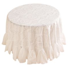 a white table cloth with ruffled edges