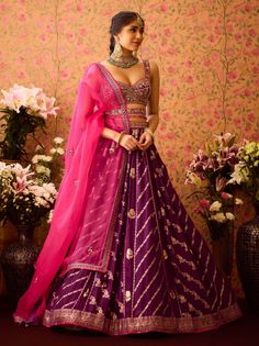 Step into refined elegance with the phlox purple hand-embroidered silk brocade blouse paired with a multi-panel brocade lehenga. This exquisite ensemble showcases intricate embroidery on the blouse, beautifully complemented by a flowing lehenga that adds depth and movement. An embroidered belt cinches the waist, while the matching dupatta completes the look, making it an ideal choice for festive celebrations and special occasions. Contrast Dupatta, Cancan Lehenga, Brocade Lehenga, Brocade Pattern, Brocade Blouse, Padded Blouse, Brocade Blouses, Embroidered Belt, Pink Lehenga