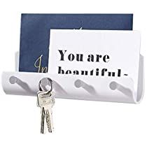 there is a key holder with two keys on it and a card that says you are beautiful