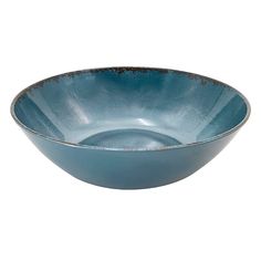 a blue bowl sitting on top of a white table