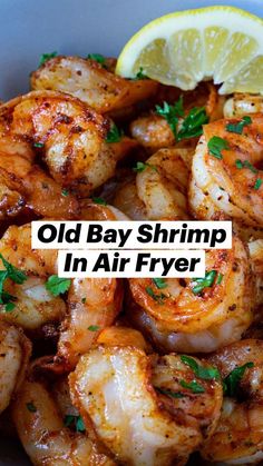 an old bay shrimp in air fryer with lemon wedges