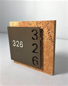 a close up of a plaque with numbers on it