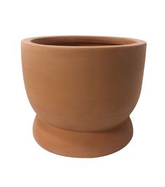 a large clay pot sitting on top of a white surface