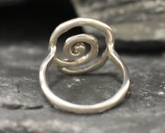 Silver Infinity Ring made of Solid 925 Sterling Silver ☞ made to last.Click here for ☞ Matching Earrings﻿Details:• Large Silver Swirl Ring • Dimensions: Band Width 2.1mm Thickness 1mm• Solid 925 Sterling SilverSKU 1643 Modern Twist Swirl Jewelry As Gift, Modern Twist Swirl Jewelry For Gift, Hand Forged Silver Swirl Jewelry, Spiral Silver Jewelry For Anniversary, Silver Spiral Jewelry For Anniversary, Handmade Swirl Jewelry With A Modern Twist, Spiral Sterling Silver Jewelry For Anniversary, Spiral Nickel-free Jewelry For Anniversary, Modern Twist Spiral Jewelry For Anniversary