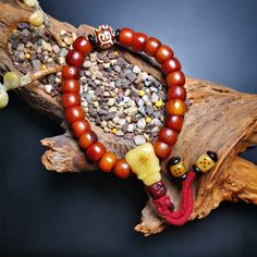 ❤This bone mala bracelet was made by Tibetan craftsmen and come from Hepo Town, Baiyu County, the birthplace of the famous Tibetan handicrafts. Its circumference is 20cm, 24 beads in round, including 23 brown yak bone beads with a diameter of 11mm, a cloud dzi bead with a diameter of 14mm, a yak bone guru bead with a length of 22mm, and 2 yak bone dice hanging from the tail. ❤These amazing bone beads are handcrafted by artisans from Tibet,who recycle and reuse everything in daily life and spirit Traditional Hand Knotted Mala For Rituals, Traditional Adjustable Hand Knotted Mala, Traditional Mala With Large Beads For Meditation, Traditional Hand-strung Mala For Meditation, Lotus Sutra, Prayer Bead Bracelet, Nothing Is Permanent, Tibetan Prayer Beads, Buddhist Teachings