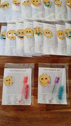 several different colored toothbrushes sitting next to each other on top of a table