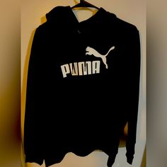 Puma Hoodie. Size 2x. Black With White Puma Logo On The Front. Brand New. Puma Logo Crew Neck Sweatshirt For Streetwear, Casual Puma Logo Sweatshirt For Winter, Casual Puma Logo Crew Neck Sweatshirt, Casual Long Sleeve Sweatshirt With Puma Logo, Winter Puma Logo Hooded Hoodie, Winter Hoodie With Puma Logo, Puma Logo Sports Hoodie, Casual Puma Logo Long Sleeve Hoodie, Puma Hooded Hoodie For Sports