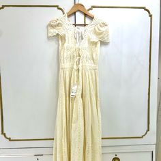 This Is An Absolutely Gorgeous Off-White, Eyelet Lace Never Worn With Tags On It Urban Outfitters Dress. Multiple Ties In Back. Sadly It’s Just Too Small For Me. The Measurements Are Waist 30 In 32-38in Variable In Bust 49 Long Fitted Broderie Anglaise Maxi Dress For Summer, Summer Beige Broderie Anglaise Dress, Spring Vacation Maxi Dress With Broderie Anglaise, Summer Daywear Maxi Dress With Broderie Anglaise, Summer Broderie Anglaise Maxi Dress For Daywear, Fitted Broderie Anglaise Maxi Dress For Spring, Broderie Anglaise Maxi Dress For Summer Daywear, Off White Lace Trim Maxi Dress For Summer, Summer Off-white Midi Dress With Lace Trim