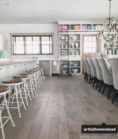 a long table and chairs in a room