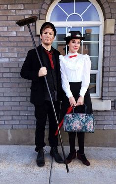 a man and woman dressed up in costumes