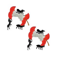 two red and white bats with black cats in the middle, one on top of another