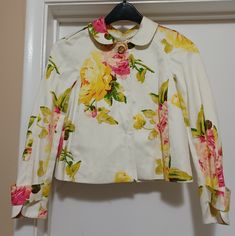 A Beautiful Jacket, Soft And Comfortable, Bright Colors. New With Tags. Size States Petite. 100% Cotton. Comes With Extra Buttons. Bust 34" Shoulder 38"(Across The Back) Sleeve 16"(From Underarm To Wrist) Spring Cream Outerwear With Floral Print, Cream Floral Print Outerwear For Spring, Designer White Spring Blazer, Designer White Blazer For Spring, White Designer Blazer For Spring, Designer Floral Print Outerwear For Work, Designer Floral Print Workwear Outerwear, Chic Collared Spring Blazer, Chic Collared Blazer For Spring