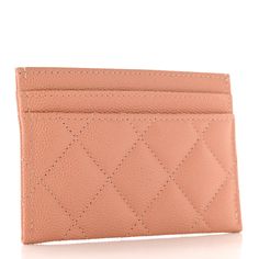 This is an authentic CHANEL Caviar Metal Perforated Quilted CC Card Holder in Beige. This fashionable card case is crafted of pebbled caviar leather in coral pink. It features a perforated gold Chanel CC logo on the front and opens to a pink fabric interior. Cc Card, Gold Chanel, Chanel Caviar, Beige Fabric, Dark Beige, Chanel Wallet, Card Holder Wallet, Cc Logo, Pink Fabric