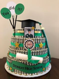 a graduation cake made to look like money